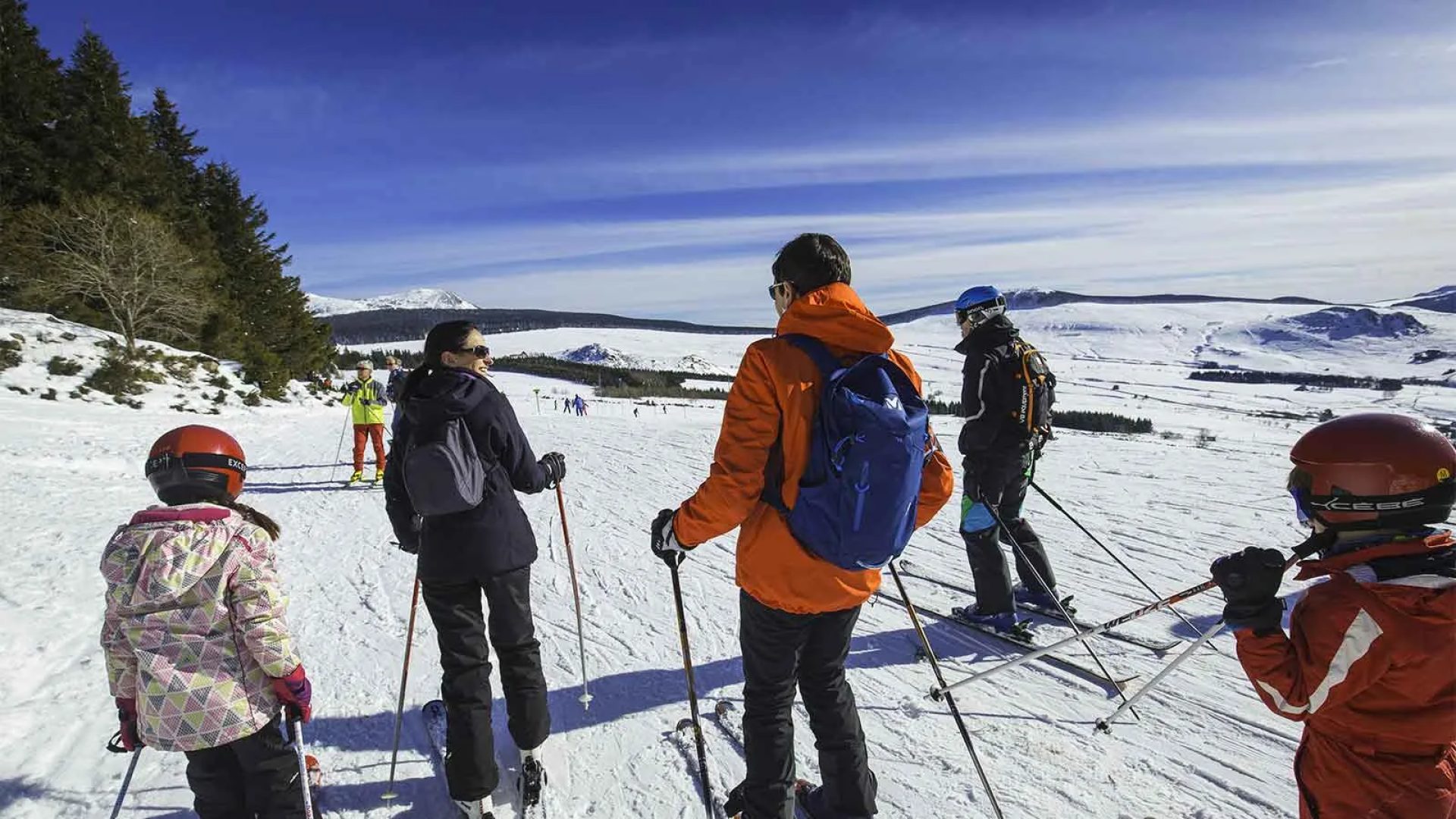 A family is skiing on Mont Mézenc in Haute-Loire, Auvergne