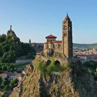 View of the Rocher Saint-Michel d'Aiguilhe, the Notre-Dame de France statue and the Puy-en-Velay in Haute-Loire, Auvergne