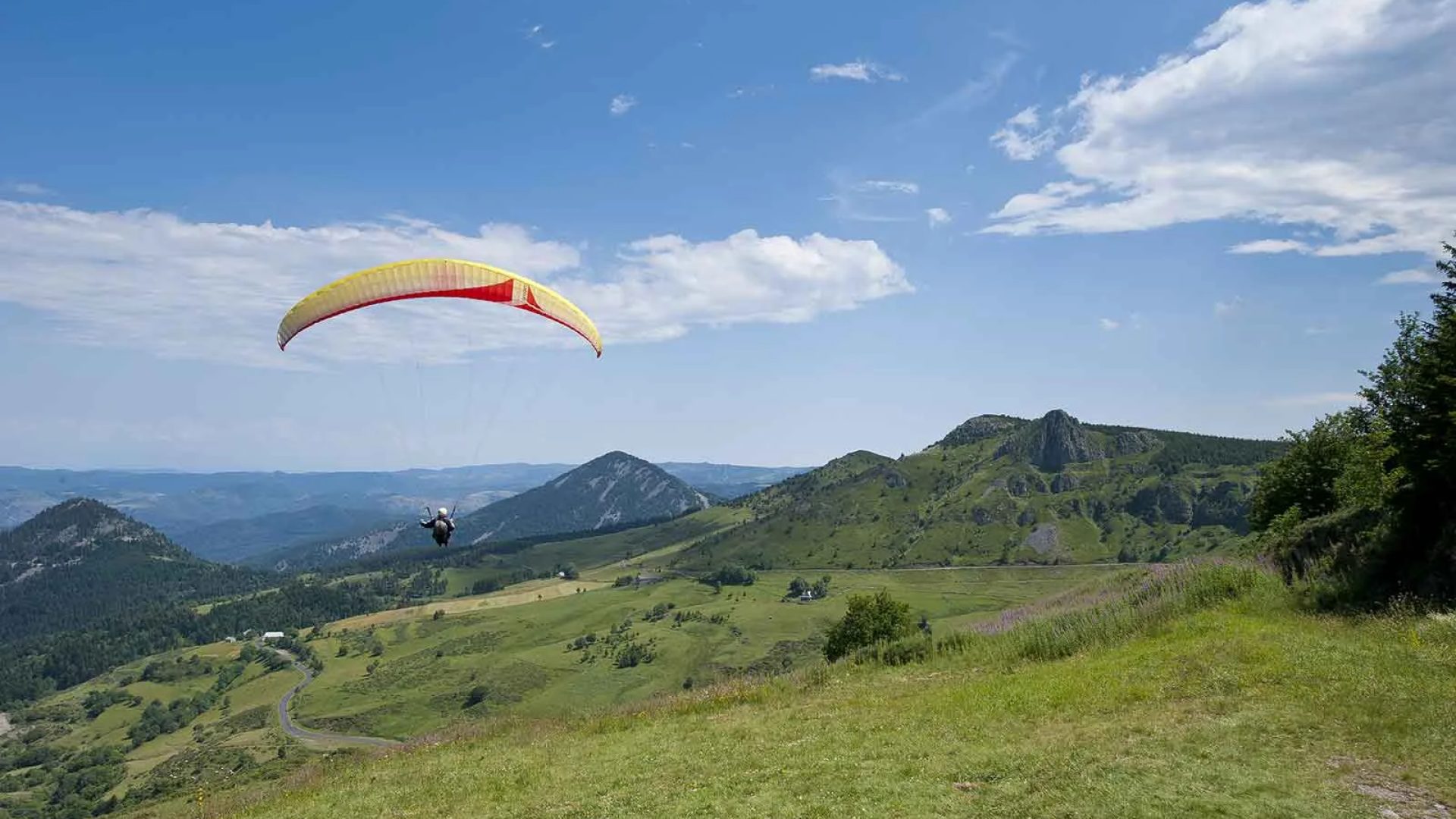Take-off of a paraglider in Haute-Loire, Auvergne